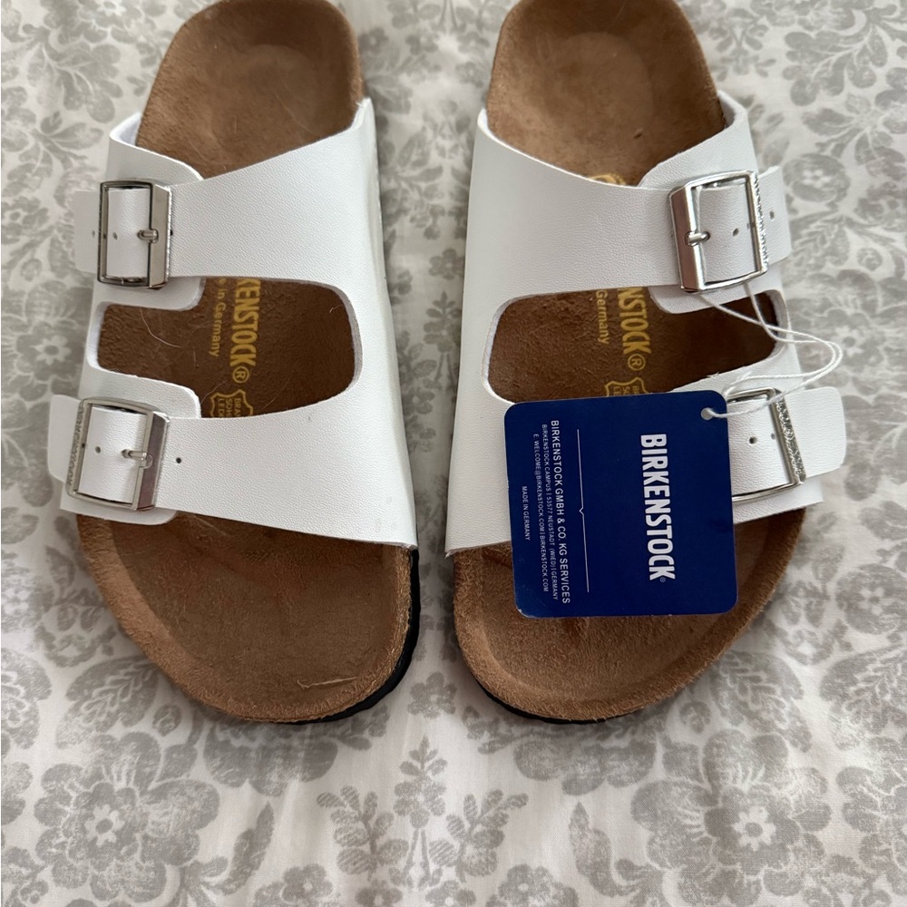 Birkenstock White Sandals with Metallic Buckles